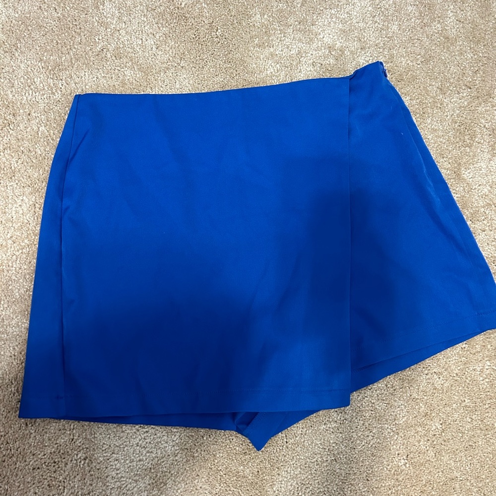 Small blue cousin Couture skirt